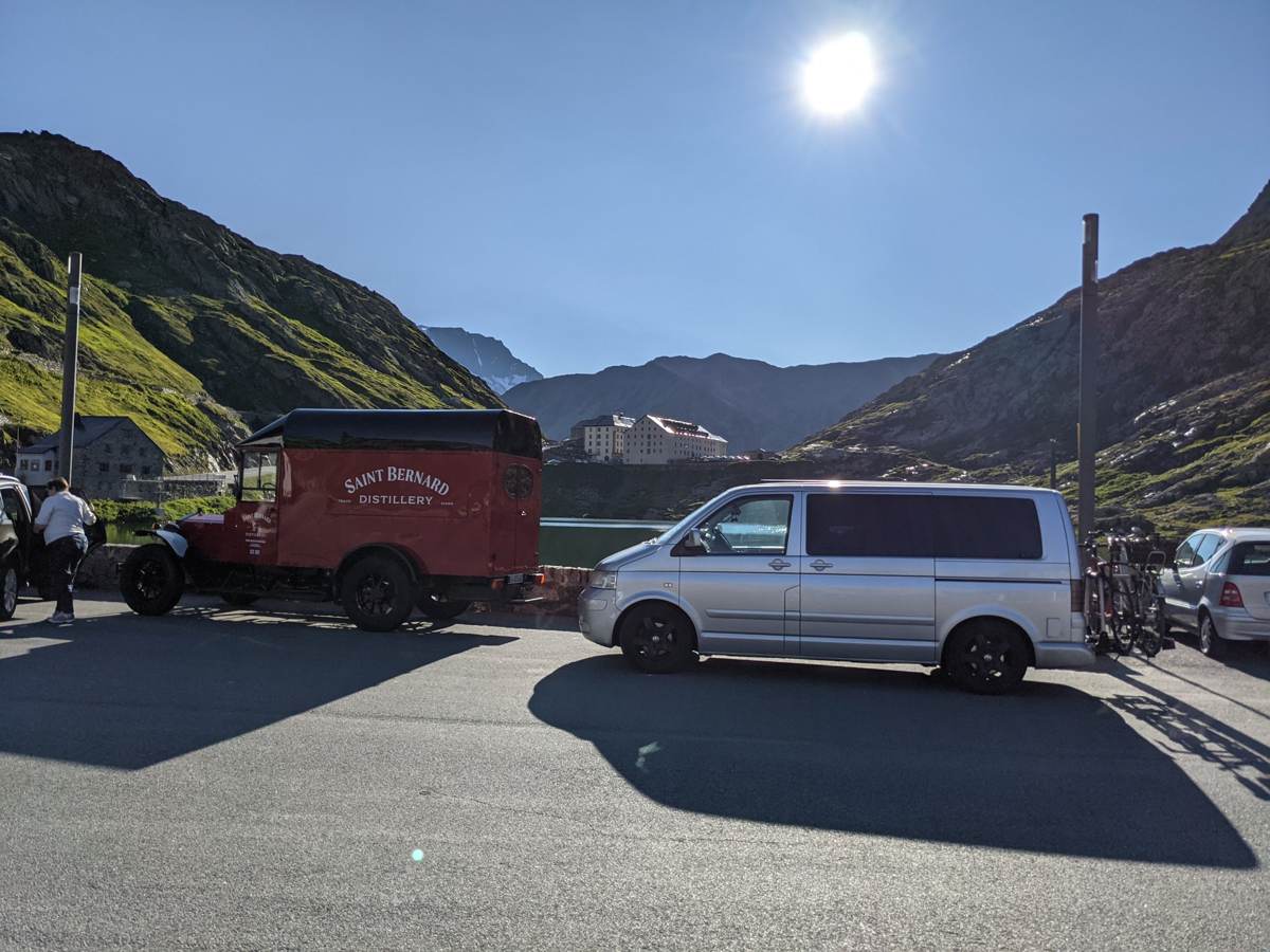 A vintage Saint Bernard branded van parked at the summit of the Grand St Bernard Pass